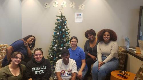 Me 1st students gather to celebrate the holidays at the Clarksville campus